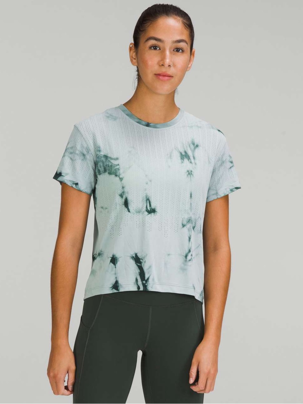 Lululemon Train to Be Short Sleeve Shirt
Rain Stripe Marble Dye Teal size S/M